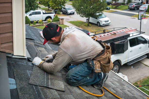 Professional Roofing technician working in Center Strafford, NH